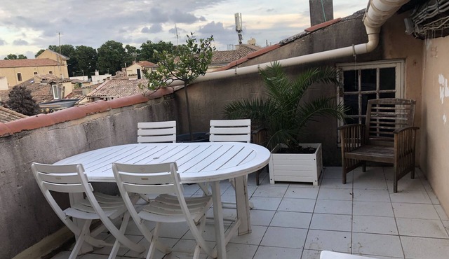 Small rooftop apartment in the city center, large roof terrace, silence