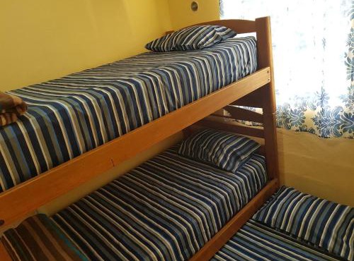 Small room with bunk bed, bathroom, AC and WiFi
