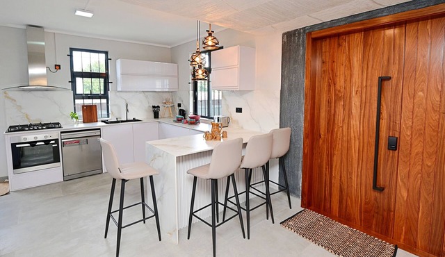Smart & Modern 2BR Home in Secure Gated Area