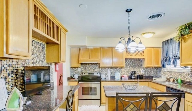 Smoke free Beautiful home close to down town, bus route with off street parking.