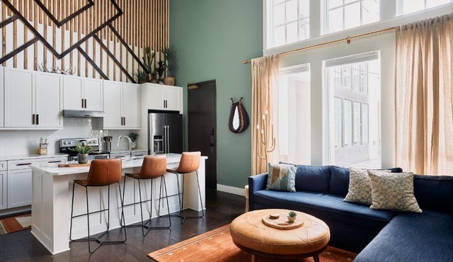 Soaring Ceilings & King Beds Overlooking Courtyard, 1 of 7 Themed Lofts at Cowrite, Find Coffee and Tacos Downstairs, Complimentary Spin Class, Walk to Shopping in 12 South, 10 Minutes to Broadway, Parking, 24 Hr Hospitality