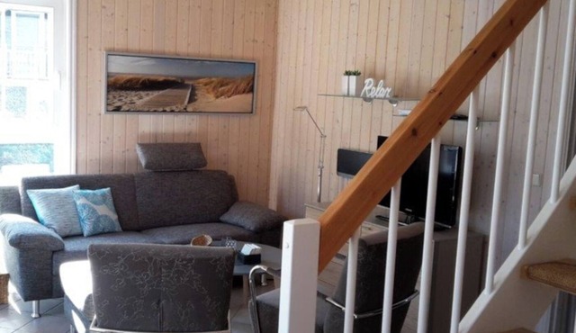 Sommerwind 202 Vacation Home in Baabe. Electric fireplace for a cozy, relaxing atmosphere. A sunny terrace for relaxing vacation moments. Soothing Relaxation in the Sauna