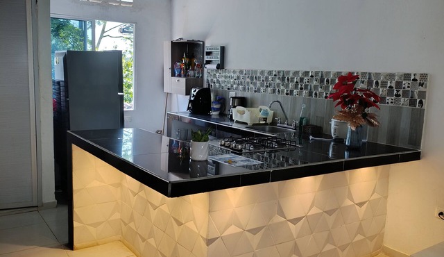 Spacious 2-bedroom cottage in tranquil Doradal Antioquia with AC, WiFi
