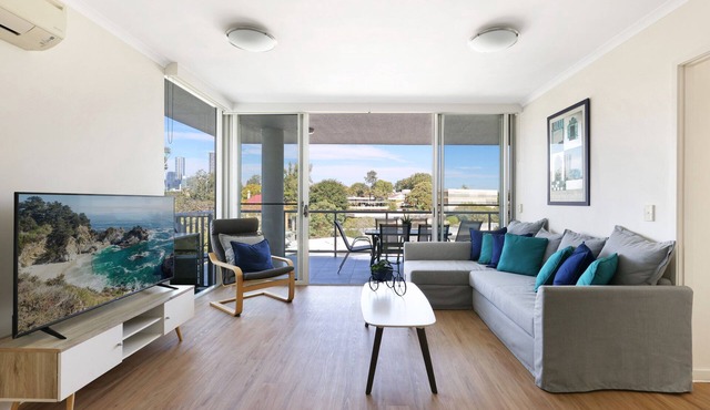 Spacious 2-Bed with City Views, Parking & Pool