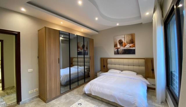 Spacious -2 bedroom apartment in adorable El Shikh Zaid with AC