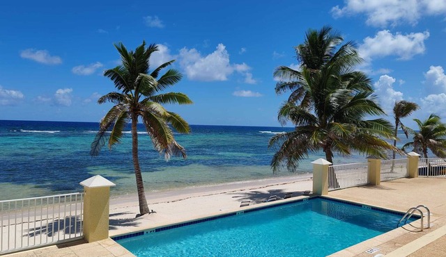 Spacious 2-bedroom ocean view condo in enchanting Bodden Town, including a car!