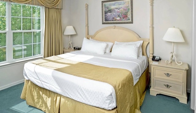 Spacious 2-Bedroom Suite with Balcony, Living Room, Fireplace, Full Kitchen