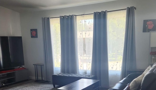 Spacious 3-bedroom Duplex, sleeps 6, heated garage and close to shopping.