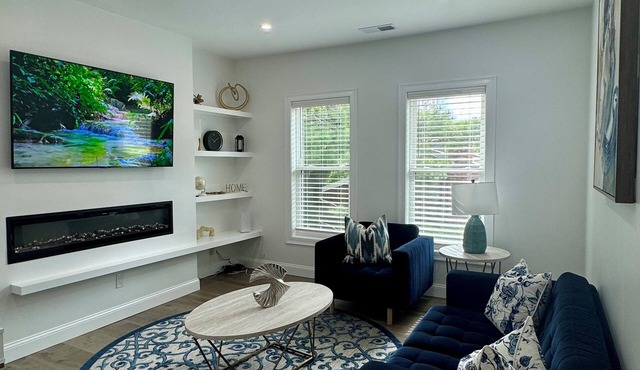 Spacious 3-BR Condo with Modern Fireplace & Full Amenities - Near Downtown