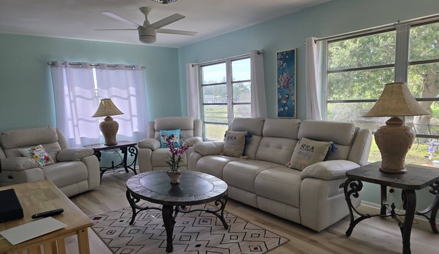Spacious 4-bedroom house in charming Rotonda West with WiFi, AC, canal front.