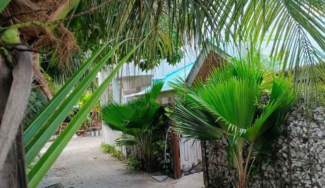 Spacious 4-bedroom villa in enchanting Dhiffushi with AC living area and kitcken