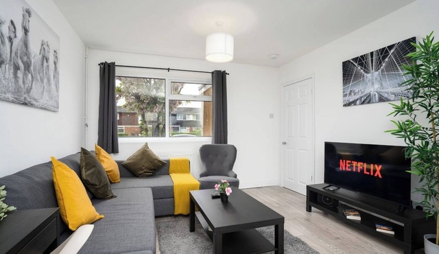 Spacious 4BR Home with Garden and Parking