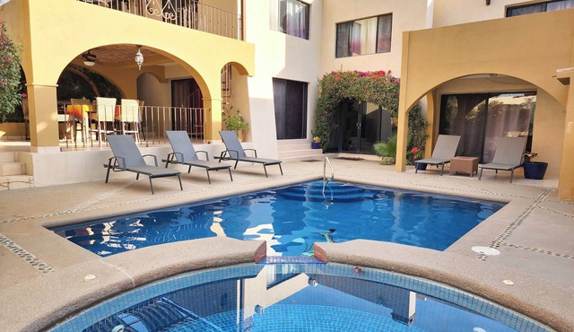 Spacious 5-Bedroom Oasis with Private Pool, Jacuzzi & Beach Access