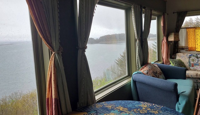 Spacious and artfully decorated home with views, 35 miles from Kodiak City.