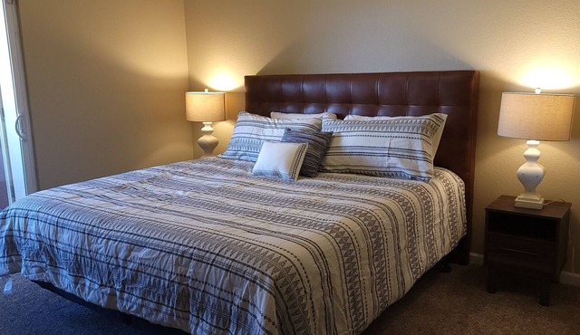 Spacious and Private 2-bedroom, 2-bathroom condo with a private 1-car garage.