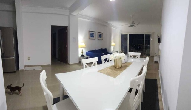 Spacious and relaxing with an amazing town skyline and far island & ocean view.