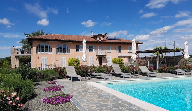 Spacious apartment in beautifully renovated property with shared pool and garden