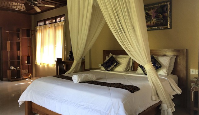 Spacious apartment with king and single bed size and air-conditioning.