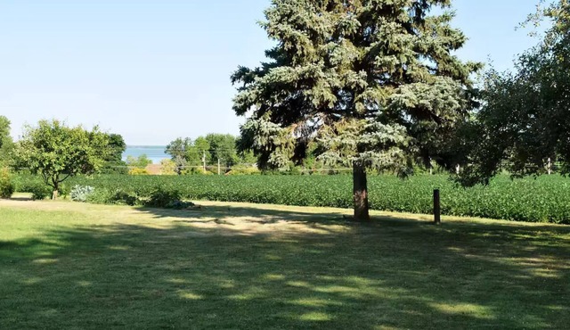 Spacious "Bayview" 4-bedroom home in serene setting. Minutes to Lambeau Field.