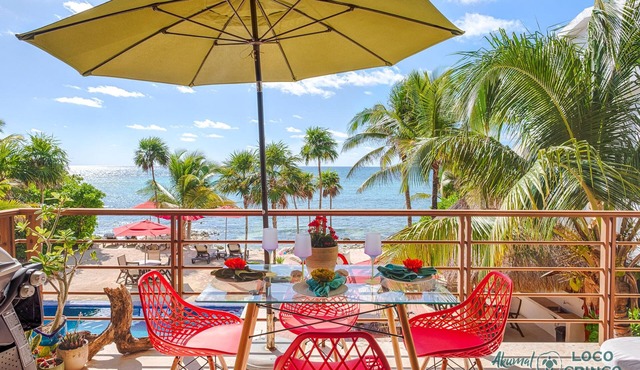 Spacious beachfront condo with AC, WiFi, swimming pool!