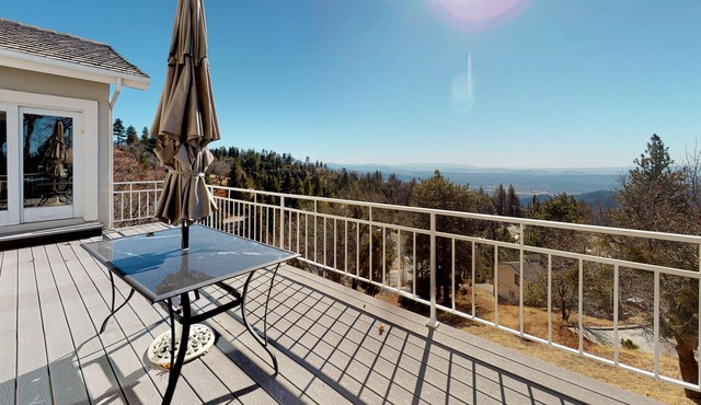 Spacious & bright home with large deck, wood fireplace, and panoramic views