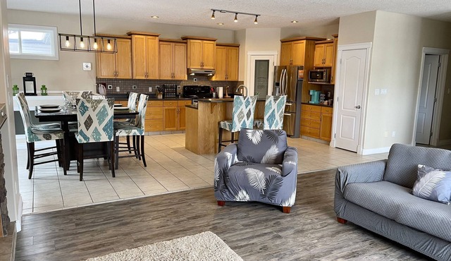Spacious bungalow with large backyard and garage close to West Ed Mall