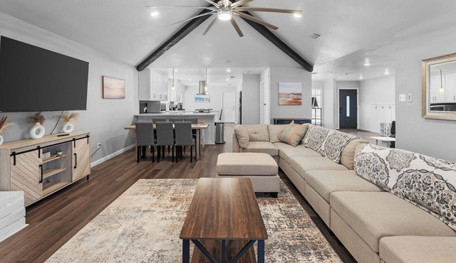 🏝️ Spacious Coastal Getaway | Sleeps 14 | SouthSide This 4BR, 2BA home is perfect for large families & groups, just a quick drive to Whitecap Beach, dining & shopping. Enjoy TWO massive living rooms, a fully stocked kitchen, & spacious dinin