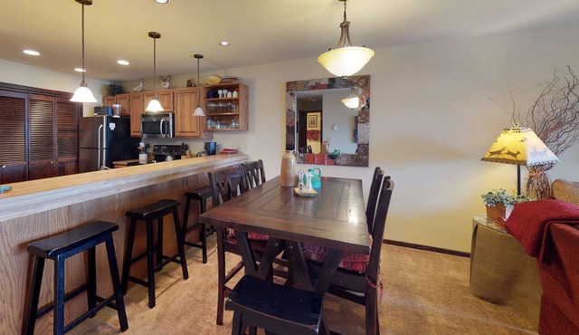 Spacious condo with balcony, lake view, and full kitchen - walk to the water