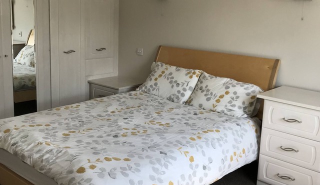 Spacious, cool, one bedroom apartment, with garden and off road parking.