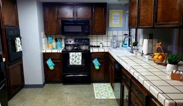 Spacious cozy 4 bedroom 2 bath home in a quiet well established neighborhood