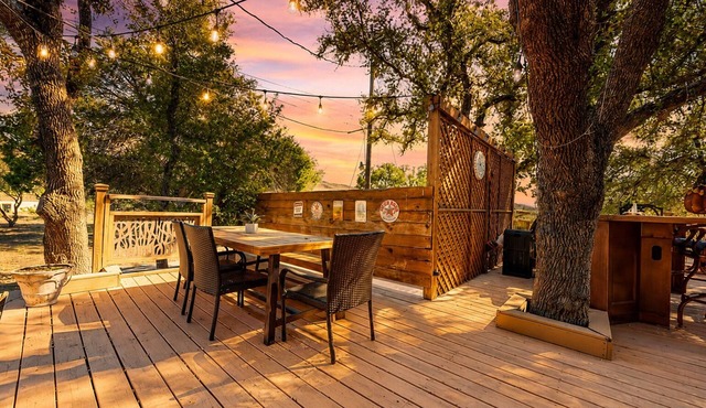 Spacious dog-friendly home settled on a serene property with wrap-around porch