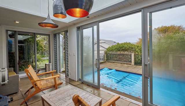 Spacious four bedroom home with Private Hot Tub, Heated Pool & Tennis Court.