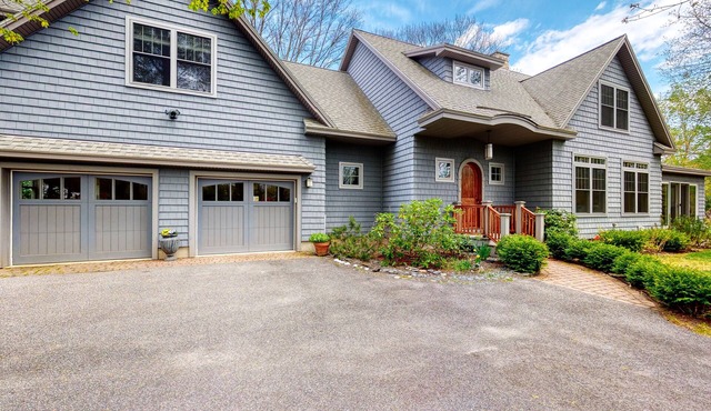 Spacious home with sunroom, yard, & fireplace - close to town & sites