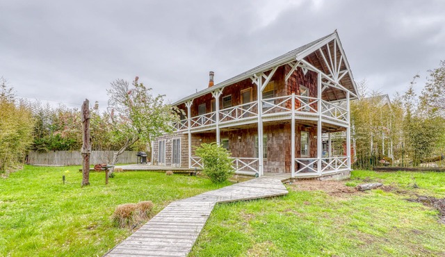 Spacious home with renovated kitchen, large deck, & tennis