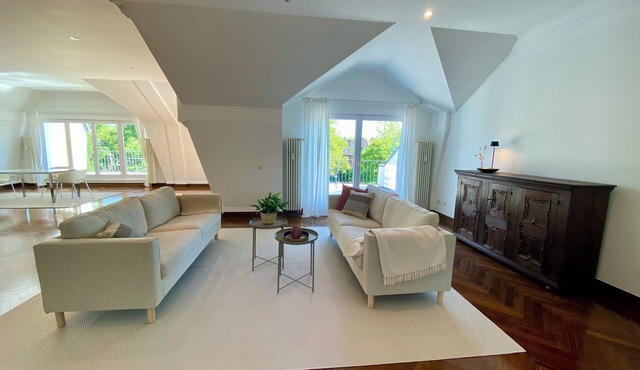 Spacious, light-flooded loft apartment with 2 terraces and views of the countryside