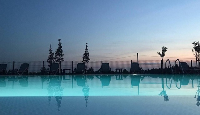 Spacious mobile homes overlooking the pool