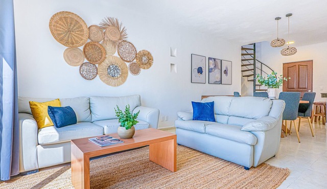 Spacious modern apartment with private balcony, pool access & steps to the beach