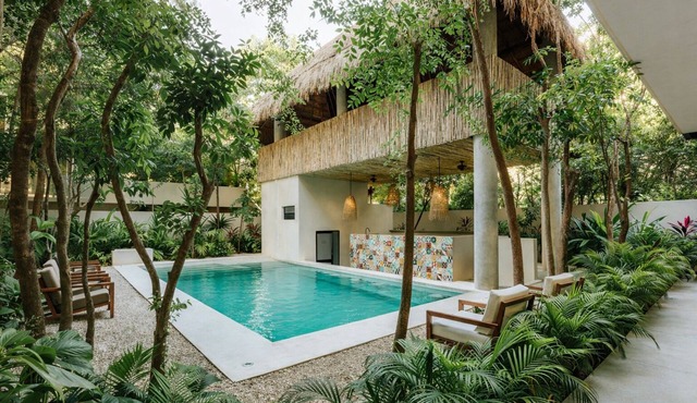 Spacious modern 3-bedroom condo in Aldea Zama with premium finishes, a lush shared pool, and easy access to restaurants, shops, and Tulum’s beaches.