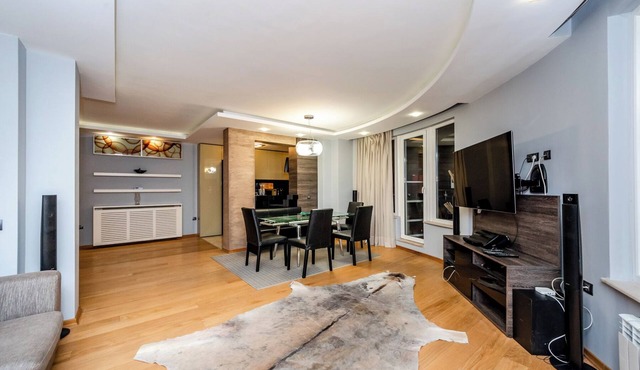 Spacious modern apartment. Large balcony overlooking the city line and mountains