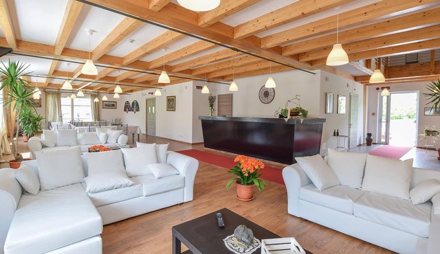 Spacious, modern vacation home with panoramic views of the mountainous landscape.