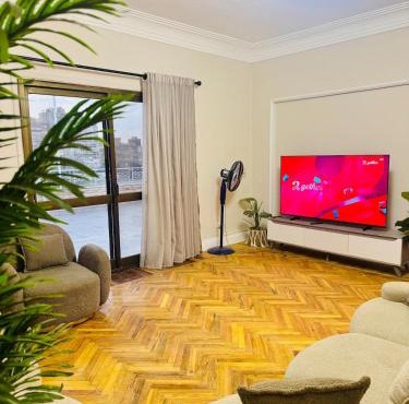 Spacious Nile View Apartment with Big Terrace