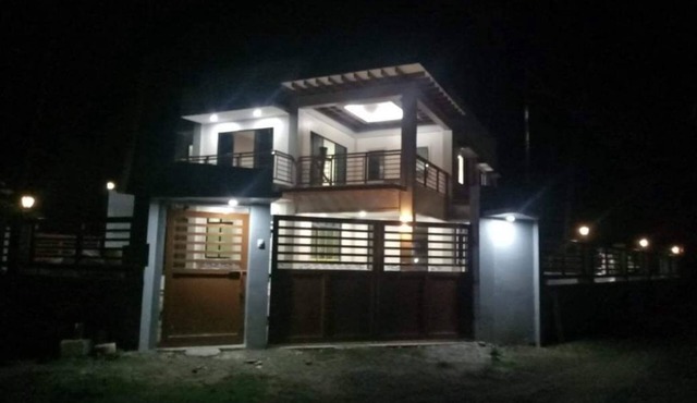 Spacious private and gated modern home within walking distance to beach/resorts.