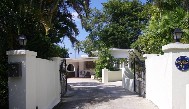 Spacious private villa in lush tropical gardens, 2 mins stroll to sea and pool.