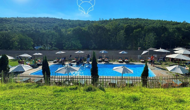 Spacious river front get-away with pool next door!
