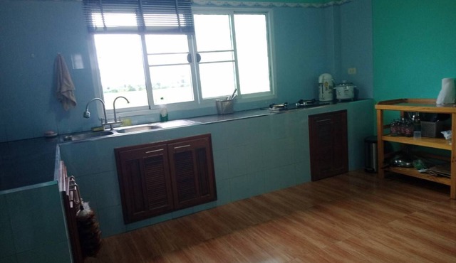 Spacious riverside off-grid 4-bedroom house with AC, Wifi