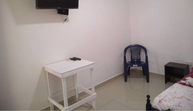 Spacious room with air conditioning and private bathroom