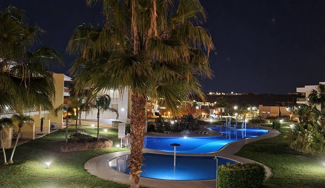 Spacious terrace apartment with pool view in a luxury residence,