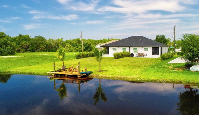 Spacious waterfront 6 Bd duplex in lovely Rotonda West near oceans .