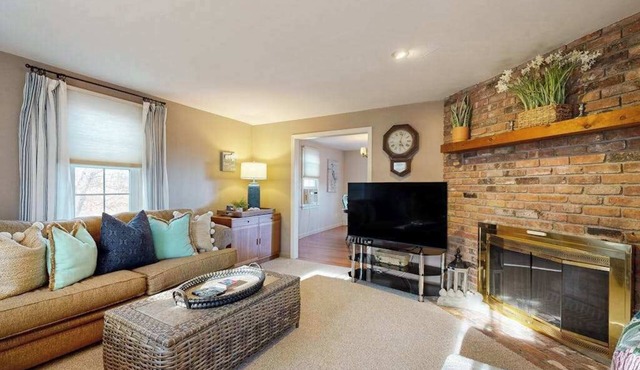 Spacious wooded retreat near canal & beach with deck & alfresco dining