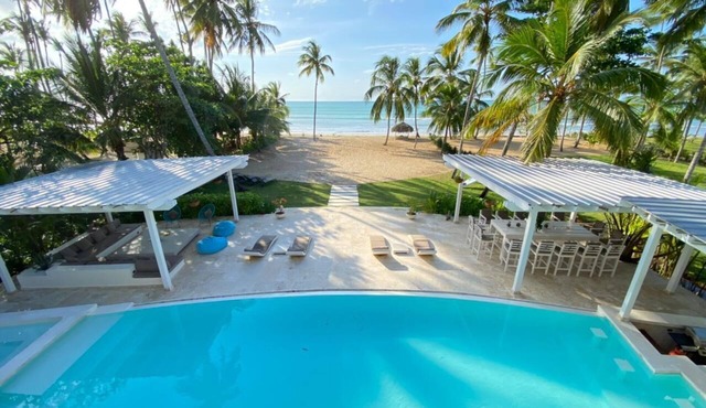Spectacular BEACHFRONT luxury Villa with private pool, Jacuzzi chef, full staff